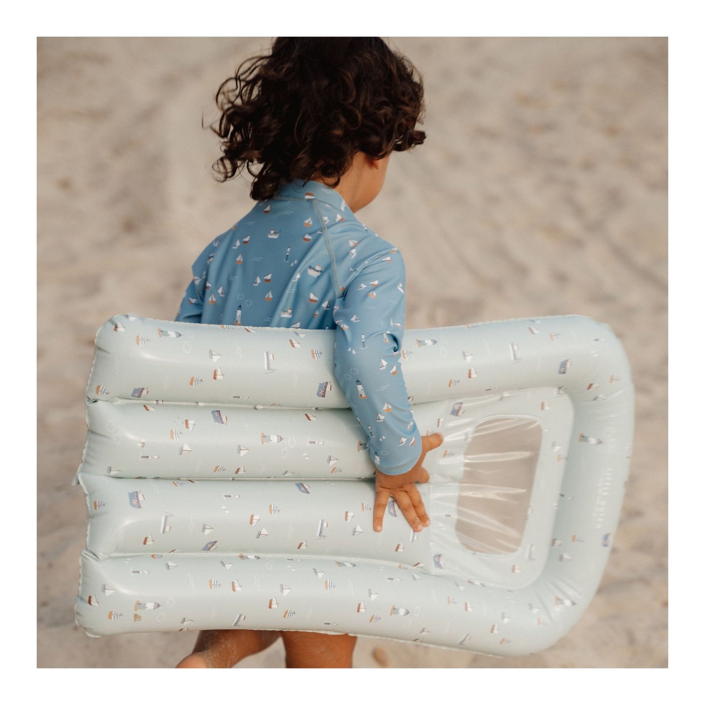Airbed Float In Sailors Bay, All children love to float around the water on warm summer days