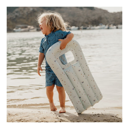 Airbed Float In Sailors Bay, All children love to float around the water on warm summer days