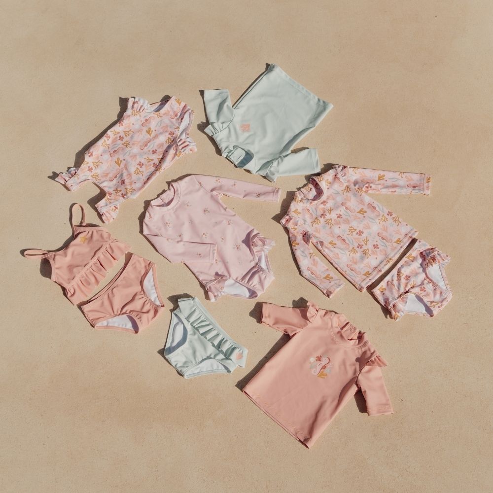 تي شيرت سباحة بأكمام قصيرة وكشكشة بلون فرس البحر الوردي